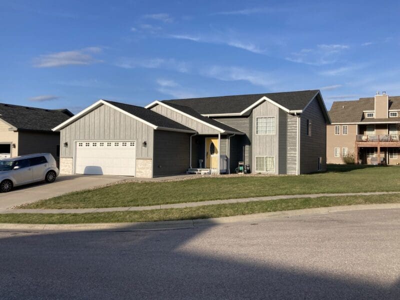 new home with gray Diamond Kote siding installation by Rypkema Renovations in Rapid City, SD